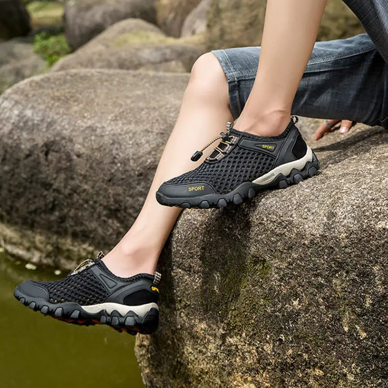 Orthopedic hiking shoes with quick dry feature